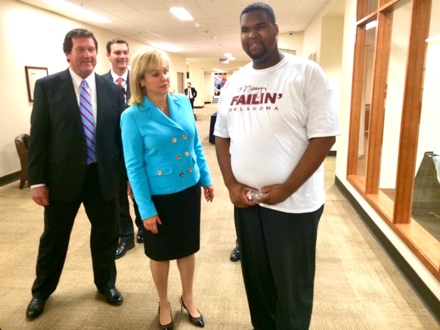 Mary Fallin when she realized she failed to read the shirt.
